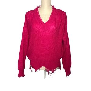 Pink long sleeve v-neck knit sweater with frayed ends